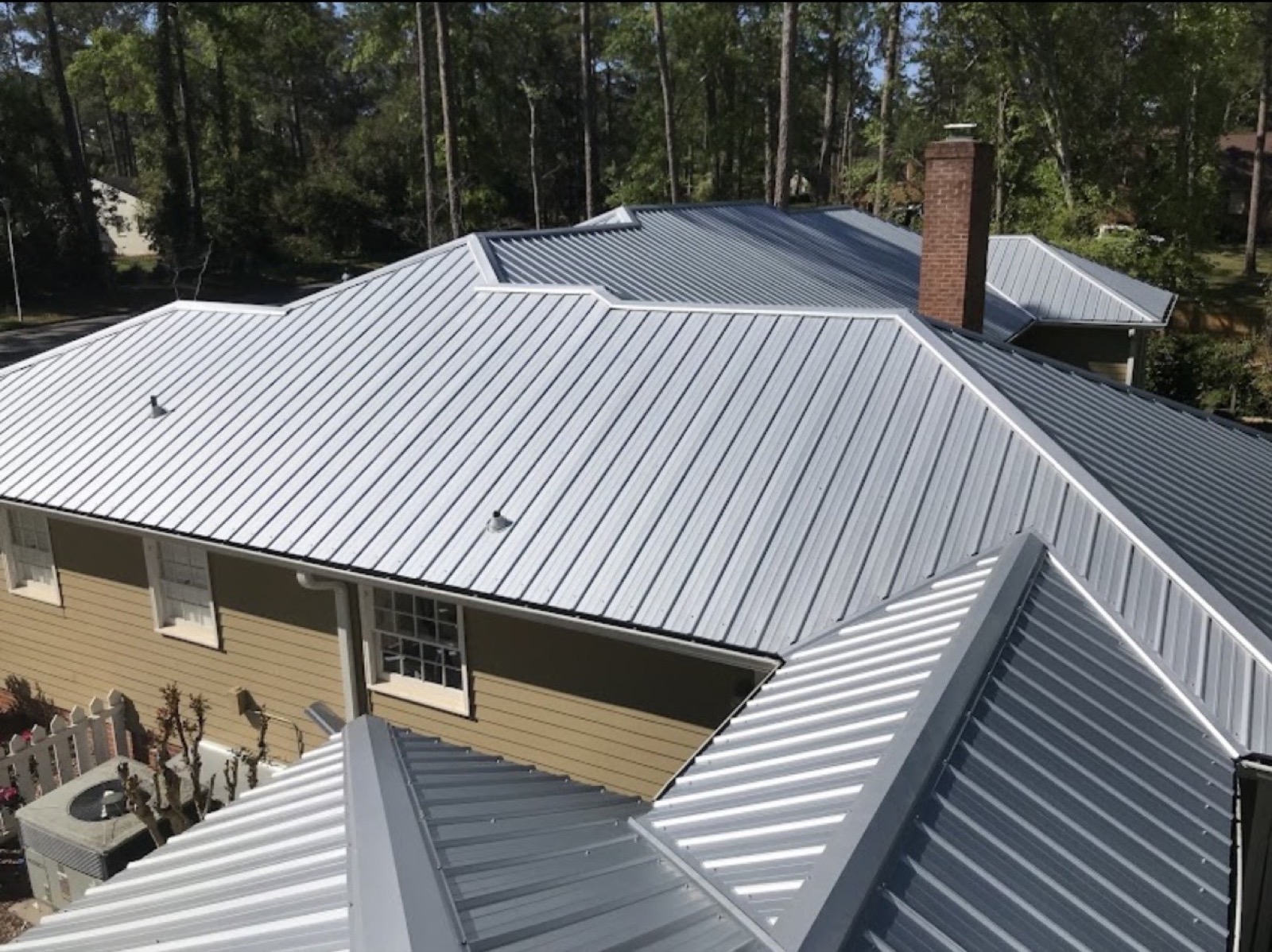 Aerial view of a finished standing-seam metal roof